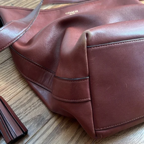Saddle-color Coach Crossbody Bucket - Picture 5 of 14